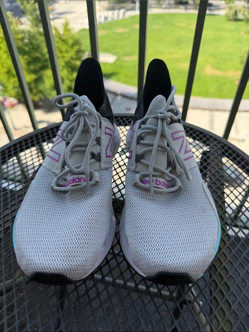 New Balance Women’s Fresh Foam Roav Light Gray Mesh Sneakers with pink trim